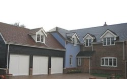 Three Cotswold Bourton up and over garage doors in Bedfordshire